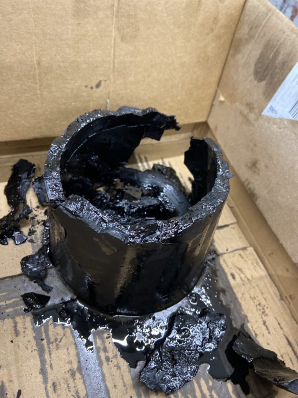 Carbon build up from a centrifugal oil filter